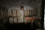 Spitbank Fort: Spithead: Portsmouth: the basement cartridge store with racking for zinc cylinders